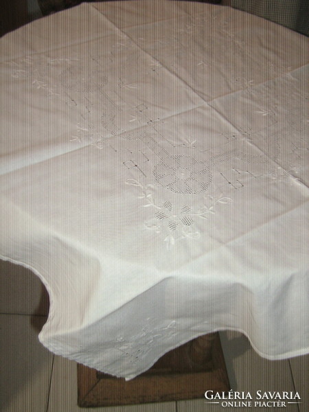 Beautiful snow-white embroidered azure floral tablecloth