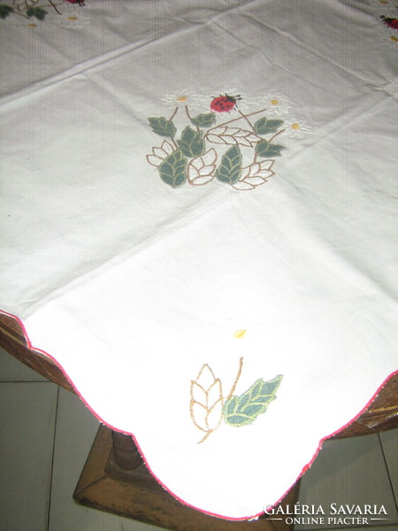 Beautiful applique ladybug and flower patterned tablecloth