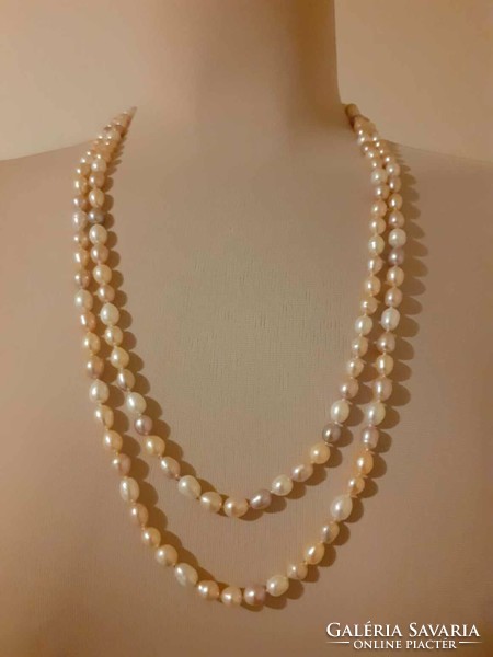 Long multi-colored cultured pearl necklace individually knotted