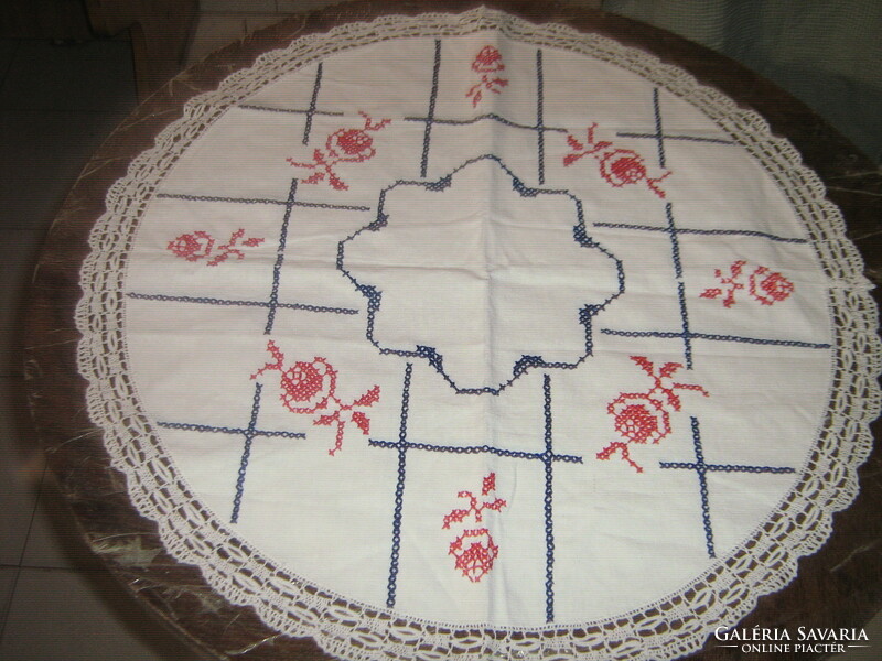 Cute hand-embroidered placemat with pink lace edge
