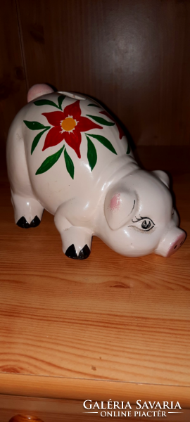 Old ceramic piggy bank with flower pattern
