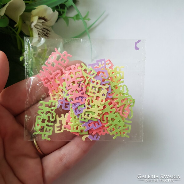 3G colorful Easter confetti in the shape of the inscription Happy Easter, decoration