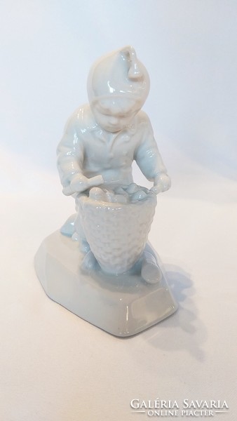 Zsolnay white underglaze little boy collecting wood (no.: 24/253.)