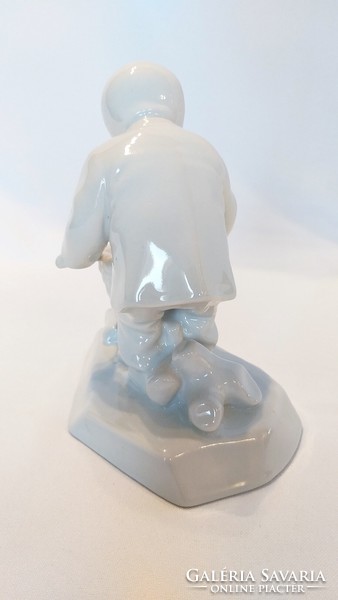 Zsolnay white underglaze little boy collecting wood (no.: 24/253.)