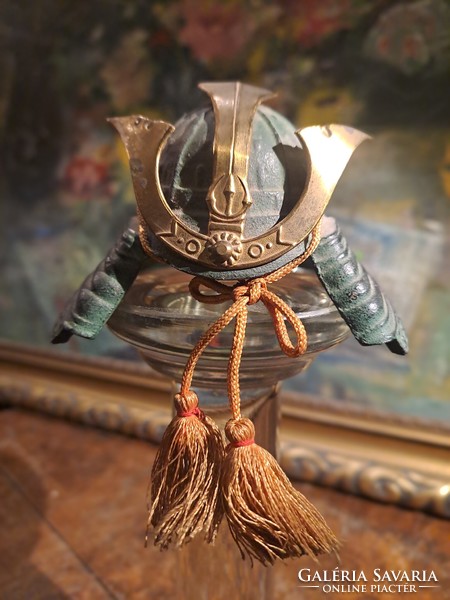 A miniature replica of a samurai kabuto helmet