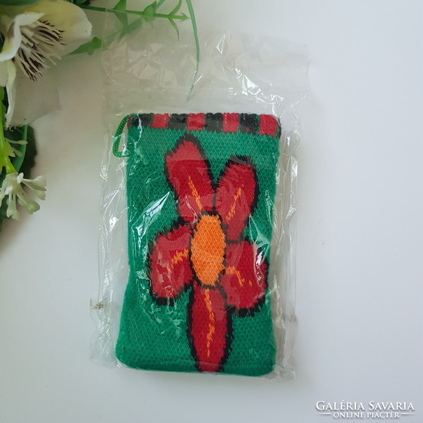 New, flower-patterned, green, retro textile phone case with a cord that can be hung around the neck