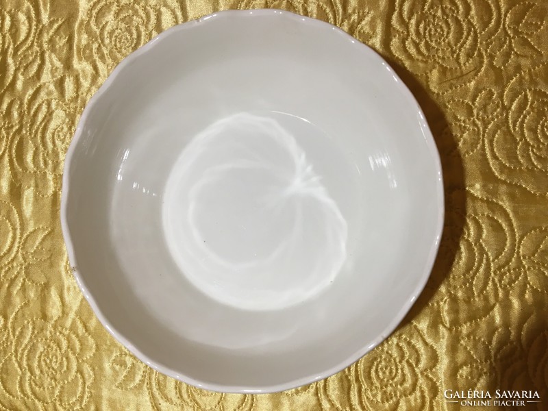 A beautiful white porcelain vintage folk bowl marked with a convex pattern in the koma bowl material
