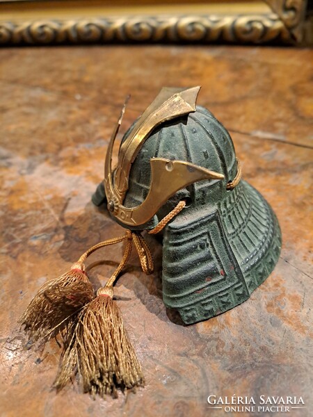 A miniature replica of a samurai kabuto helmet