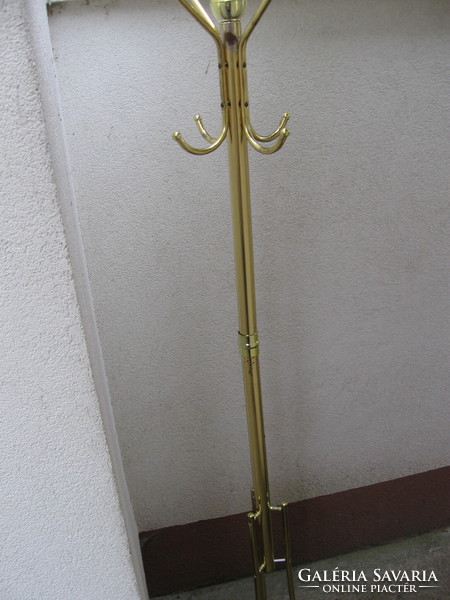 Retro gold-colored standing hanger