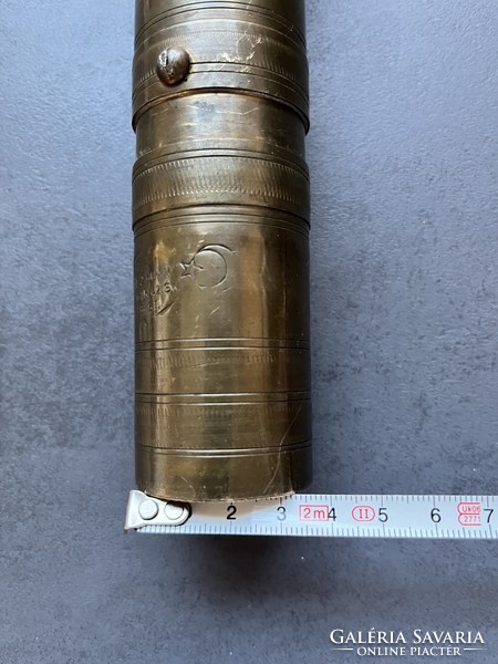 Old copper coffee grinder with oriental mark