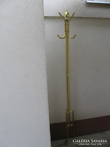 Retro gold-colored standing hanger