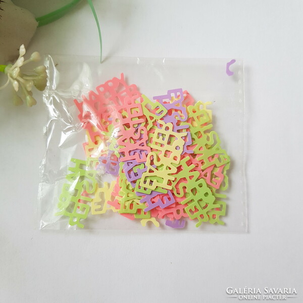 3G colorful Easter confetti in the shape of the inscription Happy Easter, decoration