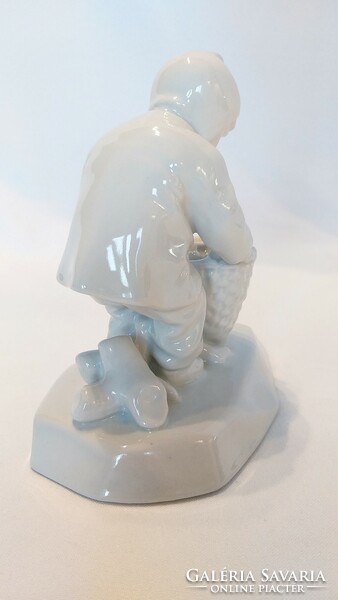 Zsolnay white underglaze little boy collecting wood (no.: 24/253.)