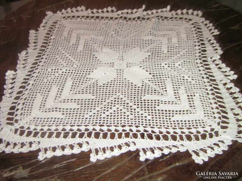 Cute hand crocheted white tablecloth
