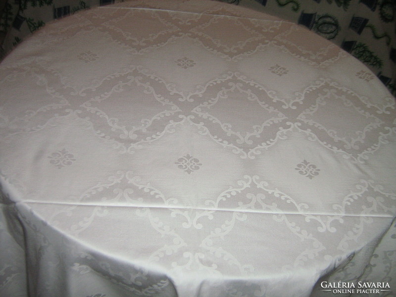 Beautiful snow-white damask duvet cover with baroque pattern