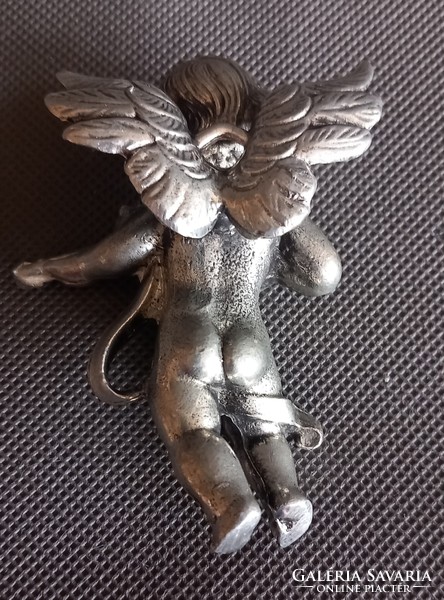 Metal putto, angel face, difficult to negotiate, art deco design