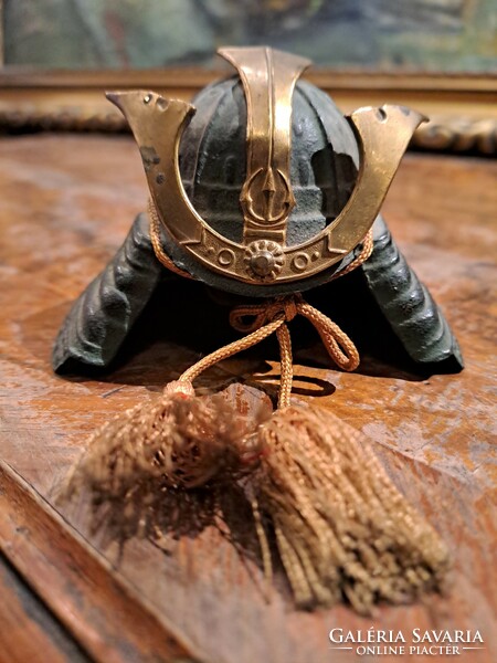 A miniature replica of a samurai kabuto helmet