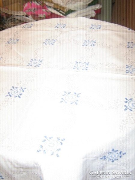 Beautiful embroidered white lacy damask tablecloth