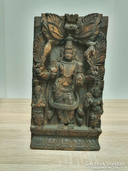 Indian carved wood with Hindu religious motifs.