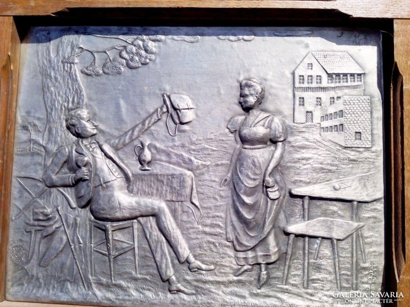 Embossed framed tin plaque with amusing Bavarian lad, a unique rarity