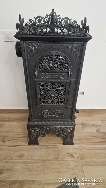 Cast iron stove with inscription 