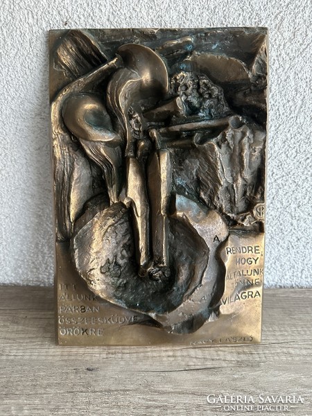 Eszter Balás 1947 bronze statue with a large László quote