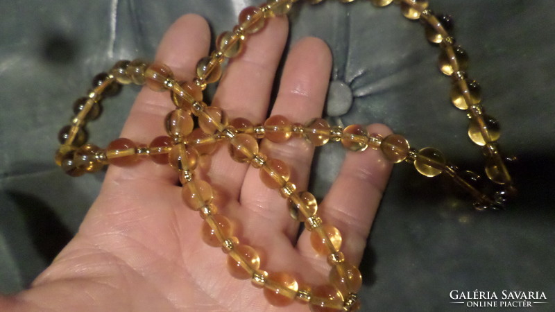 56 cm necklace of honey yellow glass beads.