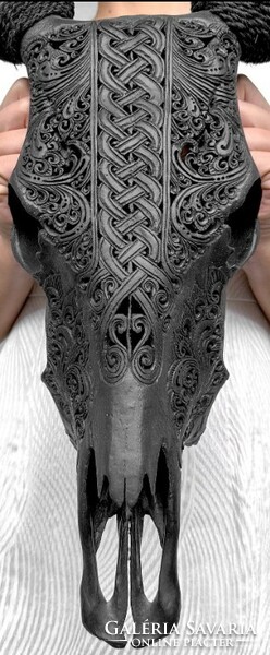 Hand carved black cow skull