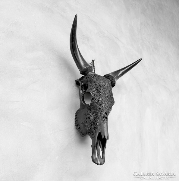 Hand carved black cow skull