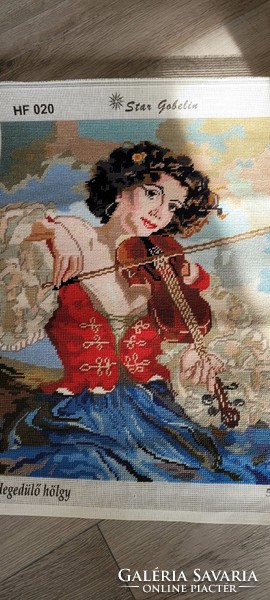 Tapestry picture - lady playing the violin