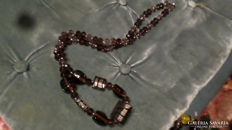 60 Cm necklace made of smoky purple crystal and handmade glass beads.