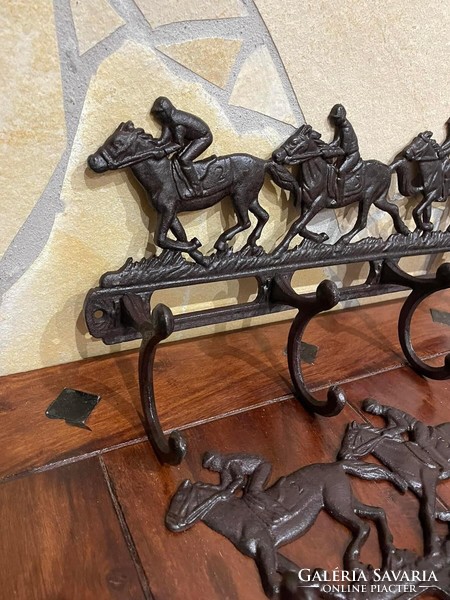 40 Cm long cast iron hanger with horse rider pattern