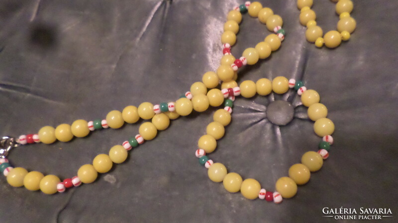2 Pcs (52 and 45 cm) retro necklaces made of yellow glass beads, together.