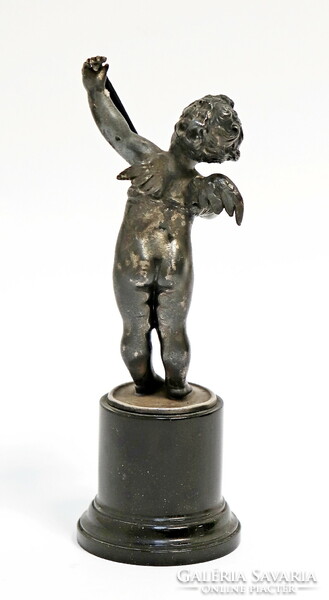 A putto playing a lute, a pewter statue