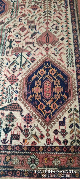 Hand-knotted nomadic Persian rug