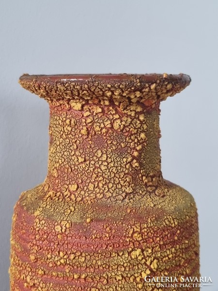 An industrial ceramic vase with an interesting surface