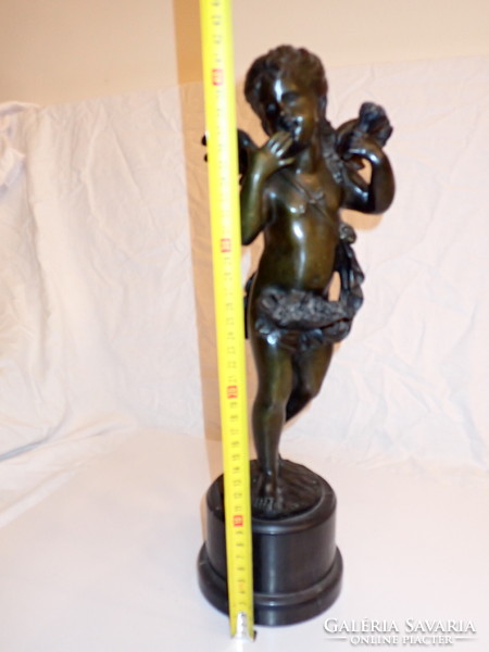 Large bronze statue of Cupid