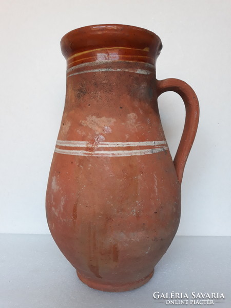 Antique large folk ceramic milk jug