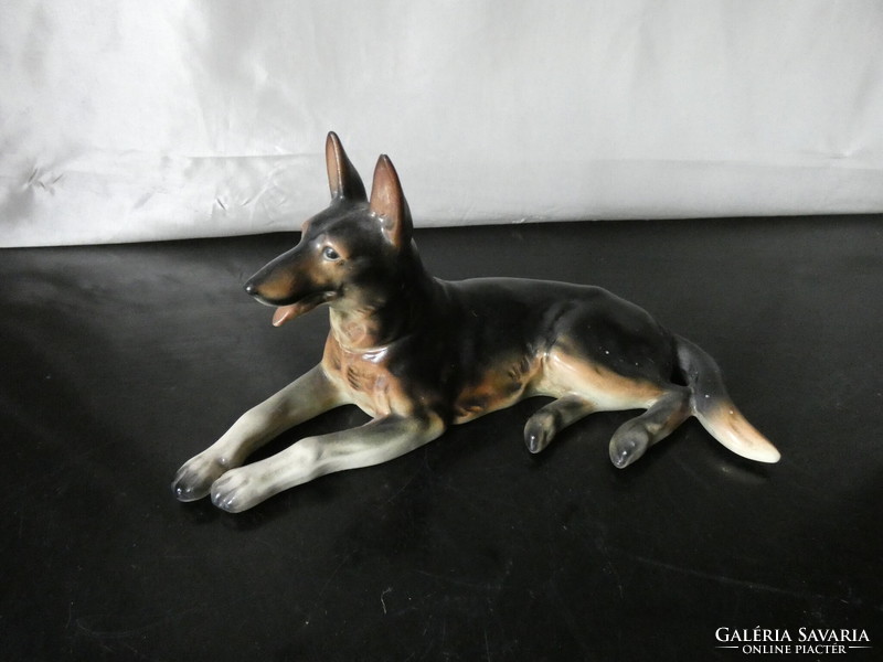 German reclining porcelain dog marked 2245 b in good condition!