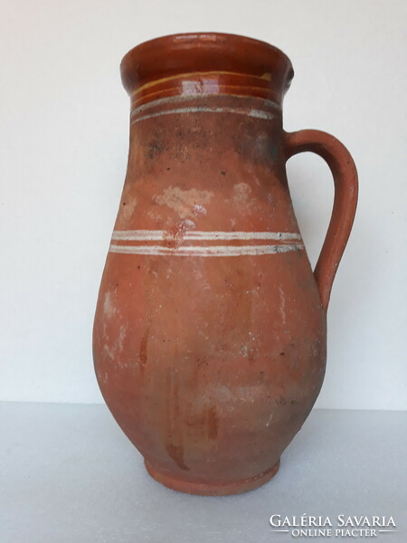 Antique large folk ceramic milk jug