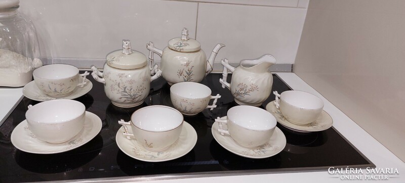Antique earthenware coffee set with embossed pattern