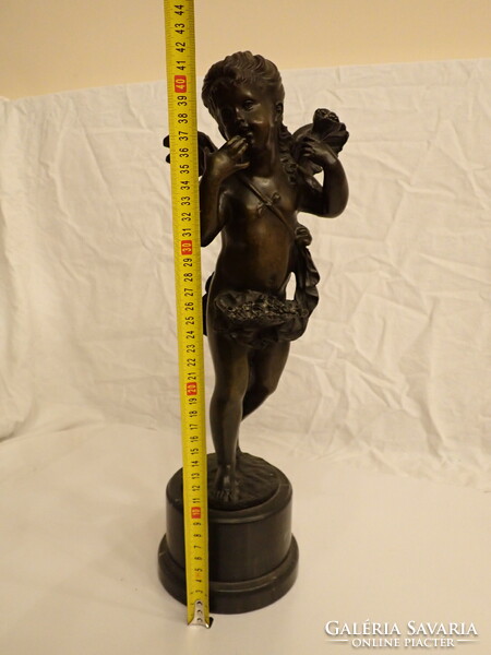 Large bronze statue of Cupid