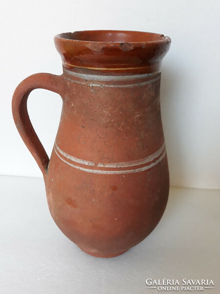 Antique large folk ceramic milk jug