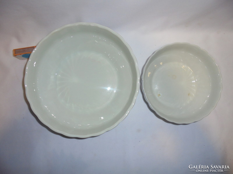 Two old, white porcelain bowls - together