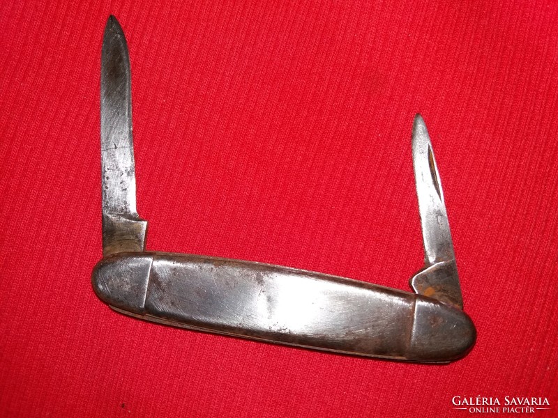 Small pocket knife / scout knife with antique metal handle as shown in the pictures