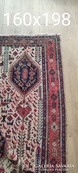 Hand-knotted nomadic Persian rug