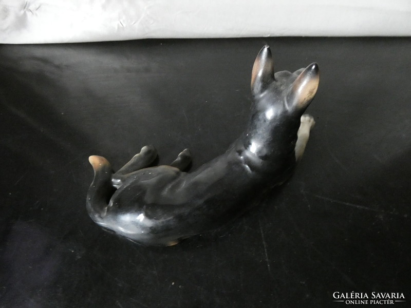German reclining porcelain dog marked 2245 b in good condition!