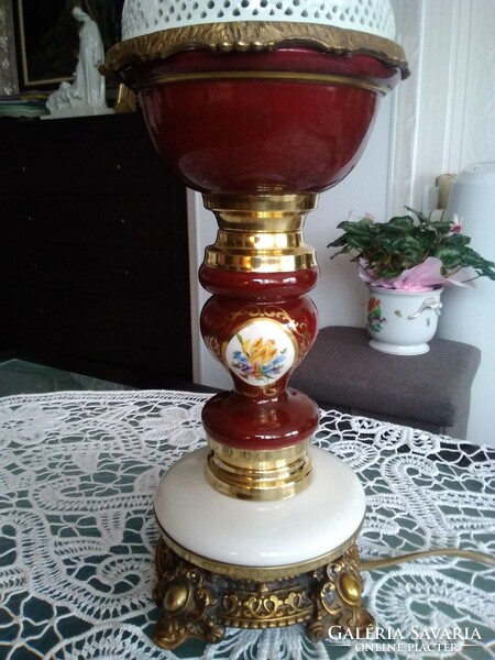 Old electric table lamp with burgundy porcelain body with white openwork pattern, copper fitting.