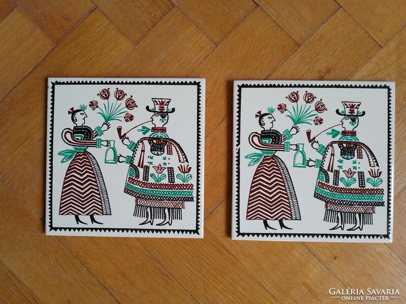 Two retro folk pattern glazed ceramic decorative tiles, tile image, male and female figures in folk costume