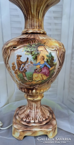 A beautiful antique scene lamp